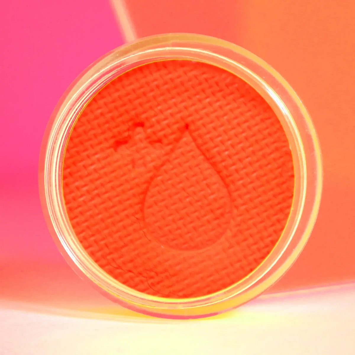 Neon orange eyeliner for rave makeup