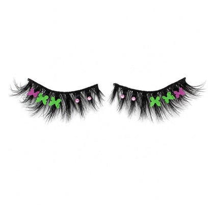 Flirty green and purple butterfly eyelashes with pink crystals