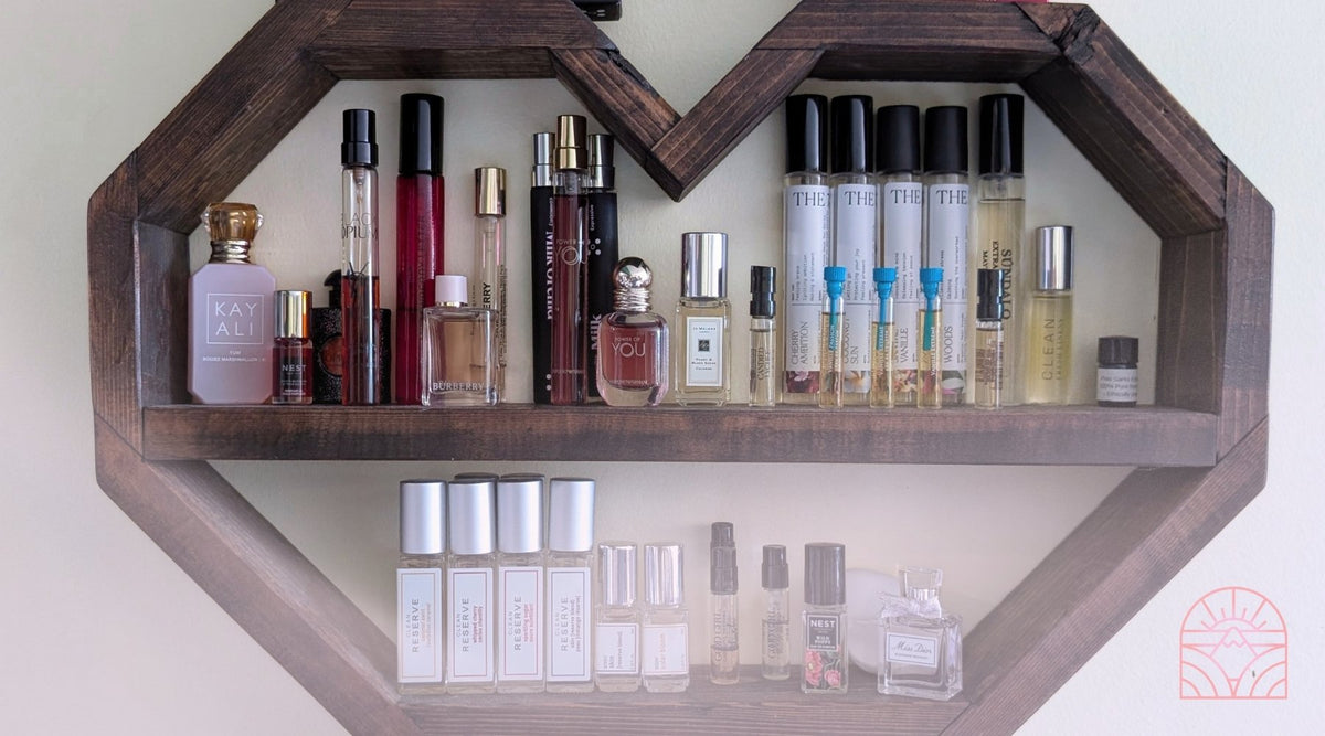 Shelf of perfume samples from kayali, 7 virtues, and YSL